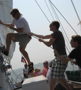 Hauling up the sails with the crew of the Schooner Woodwind