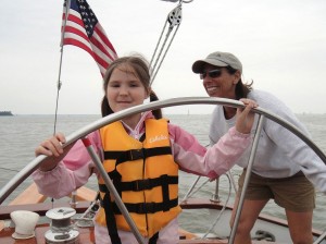 Brownies (Girl Scouts) steering the boat in Annapolis