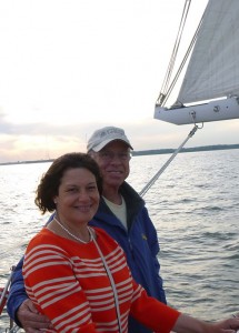 Couple Saiing the Woodwind at Sunset