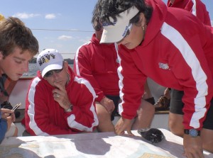 Learning the charts while team building under sail Learning the charts while team building under sail