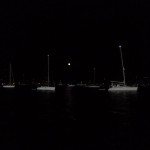 Moon rising above anchored fleet for Annapolis fireworks