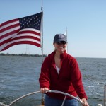 Captain Leanne on her birthday steering the Schooner Woodwind